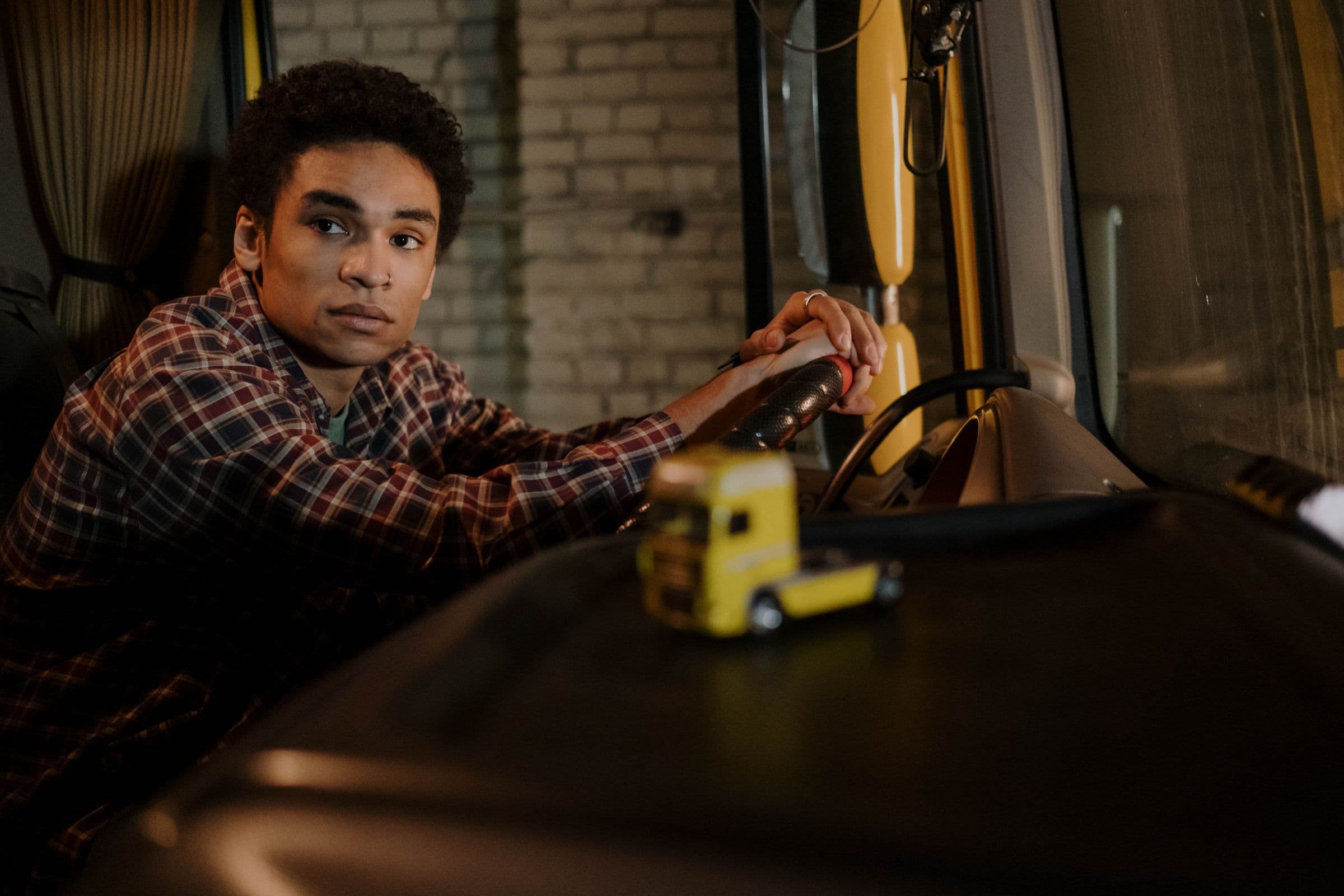 Driver finishing a dedicated route shift at a distribution yard in the evening