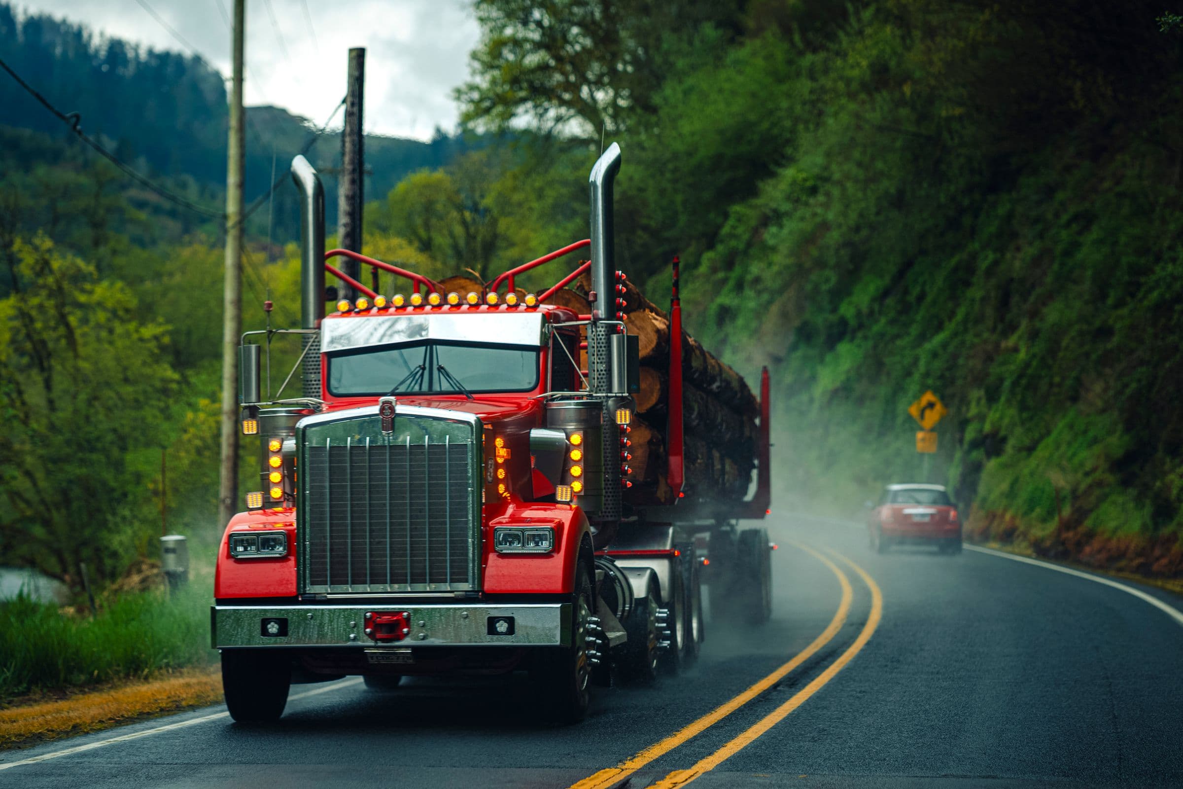 Semi truck running a regional highway corridor between cities