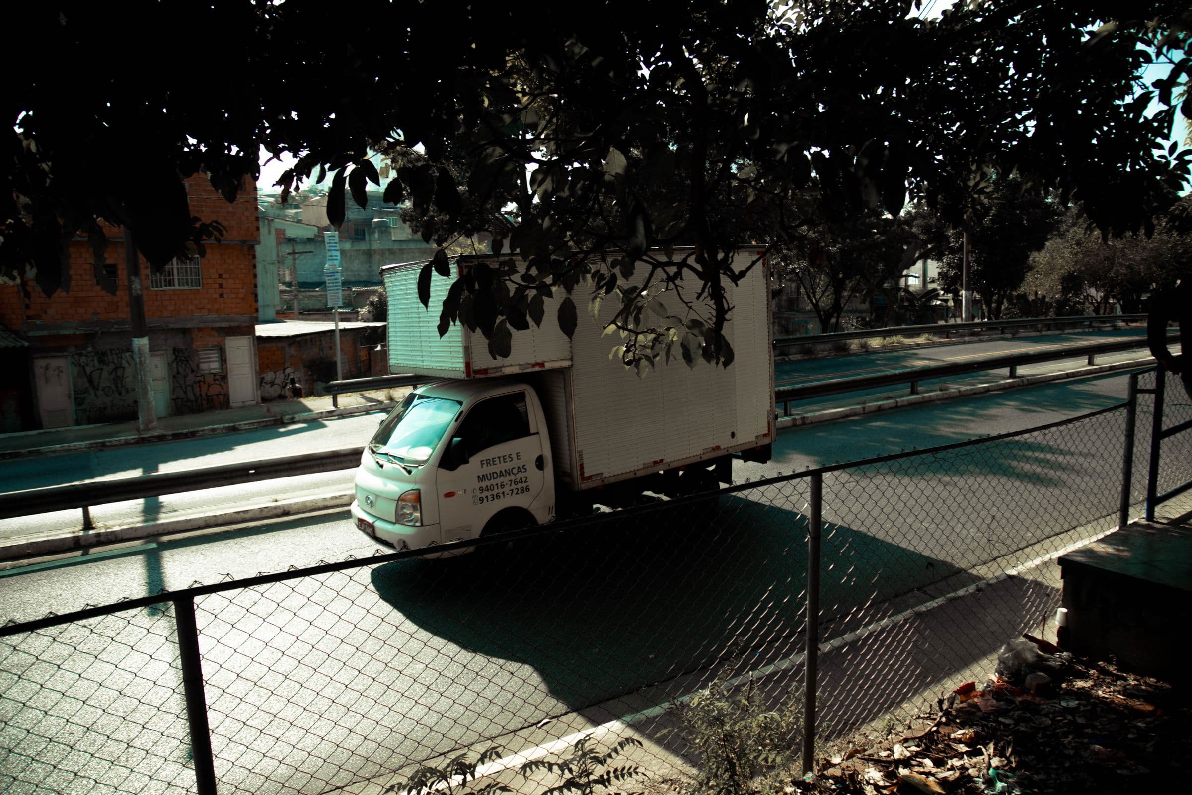 Class B box truck making a delivery stop on a city street